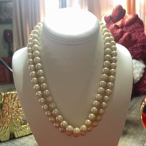 Cream colored double strand 38” long before doubling pearls. Beautiful clasp.